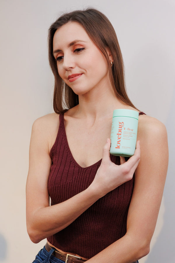 Woman with Lovebug women's probiotic