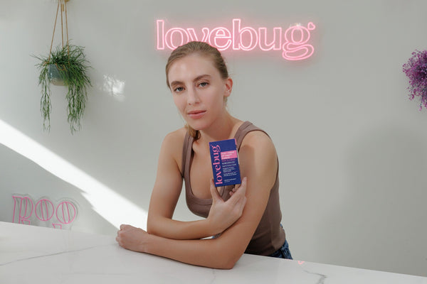 Woman with Lovebug women's probiotic